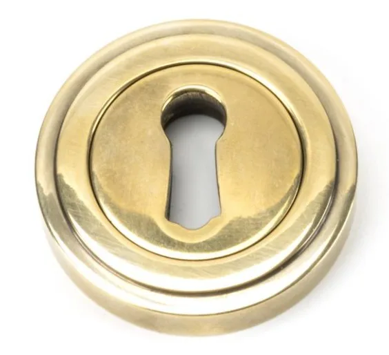 From The Anvil Art Deco Round Escutcheon Aged Brass